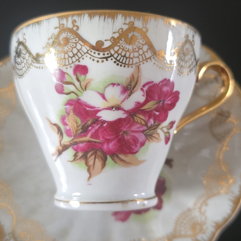 Royal Crown Hand Painted Floral Teacup and Saucer with Gold Accents